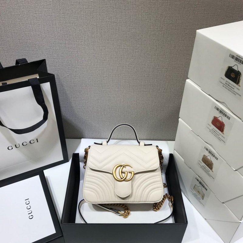 G*u*i top handle bags